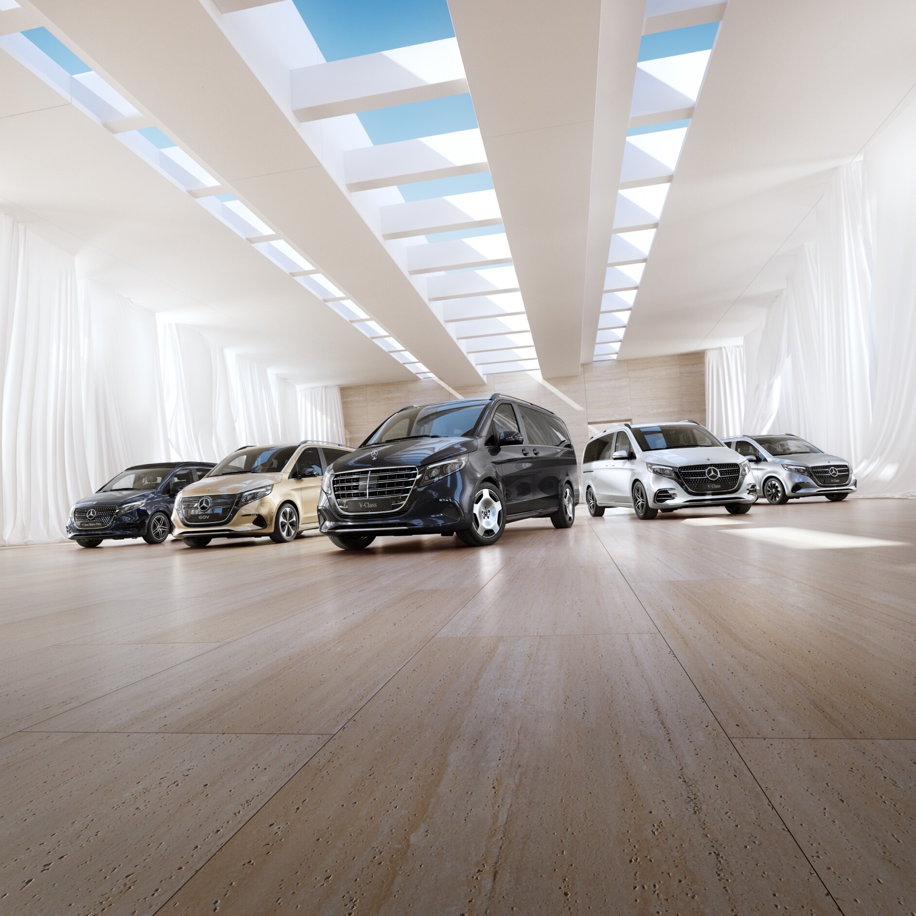 Komfort | EQV | Mercedes-Benz Transportbilar Mercedes-Benz transportbils- och campingbilsmodeller står i ett utställningsrum