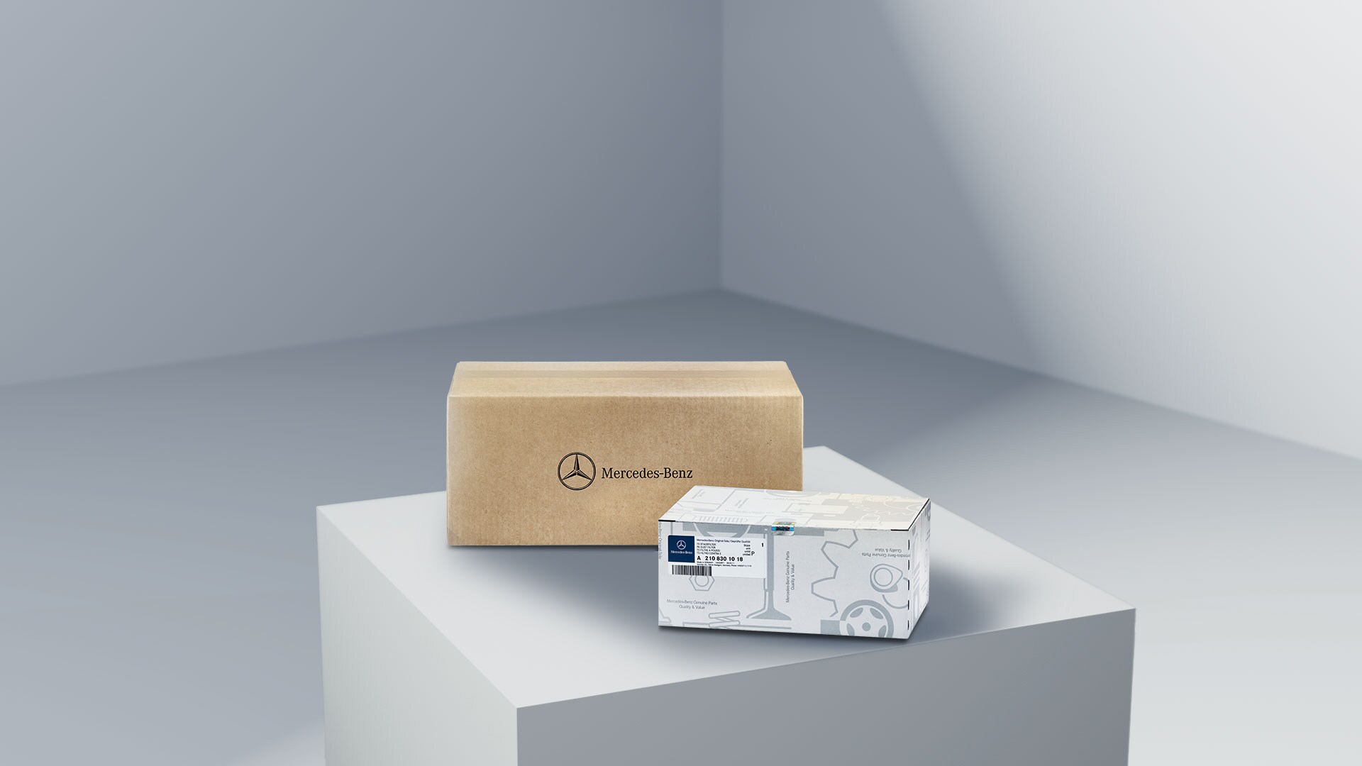 Mercedes-Benz | Transportbilar Kvalitet Originaldelar Två paket med Mercedes-Benz logotyp, som symboliserar Mercedes-Benz originaldelar, på en ljus plattform.